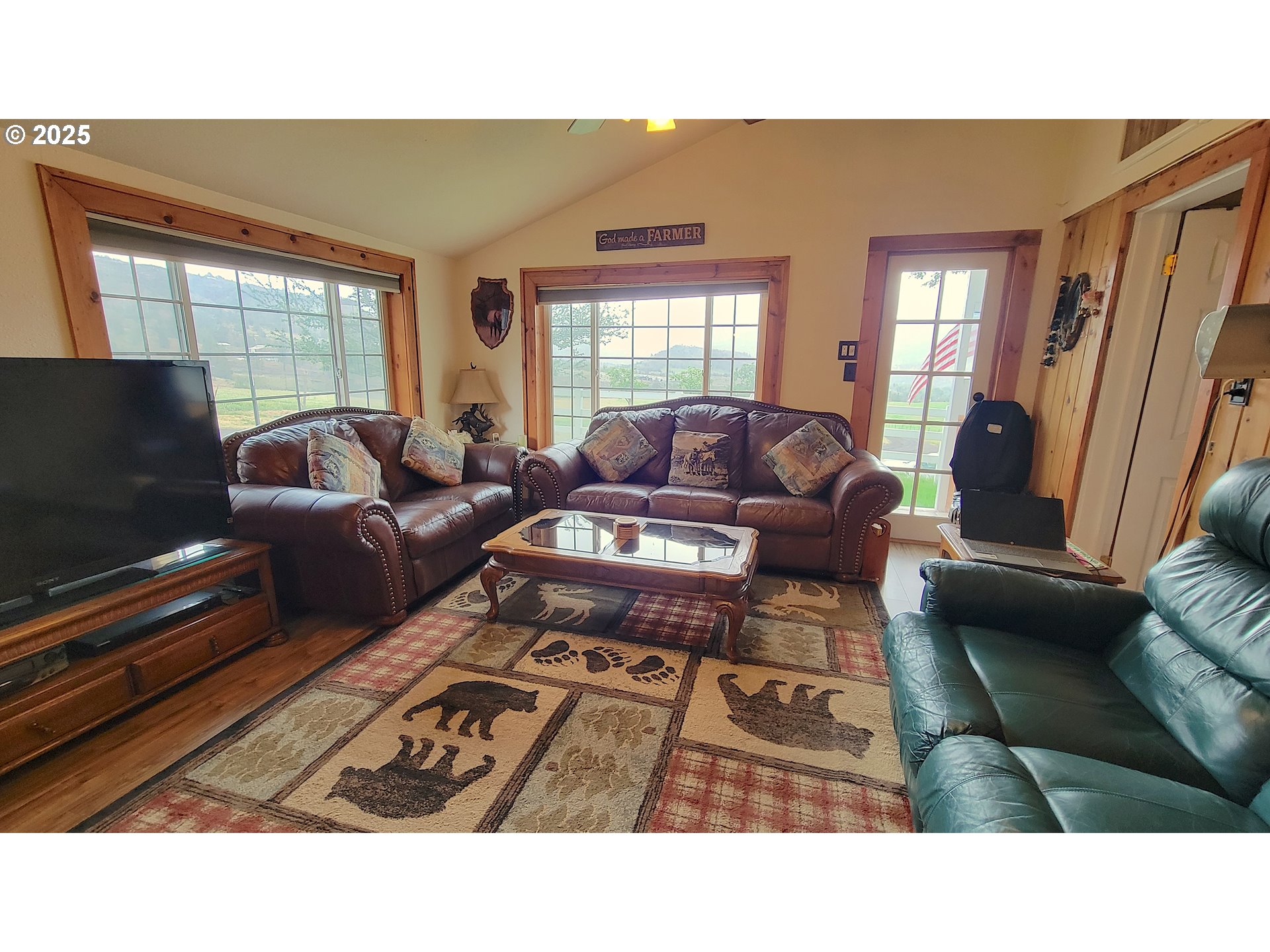 40300 Kahler Basin Road Spray, OR 97874 - Photo 6 of 26 a living room with furniture and a flat screen tv