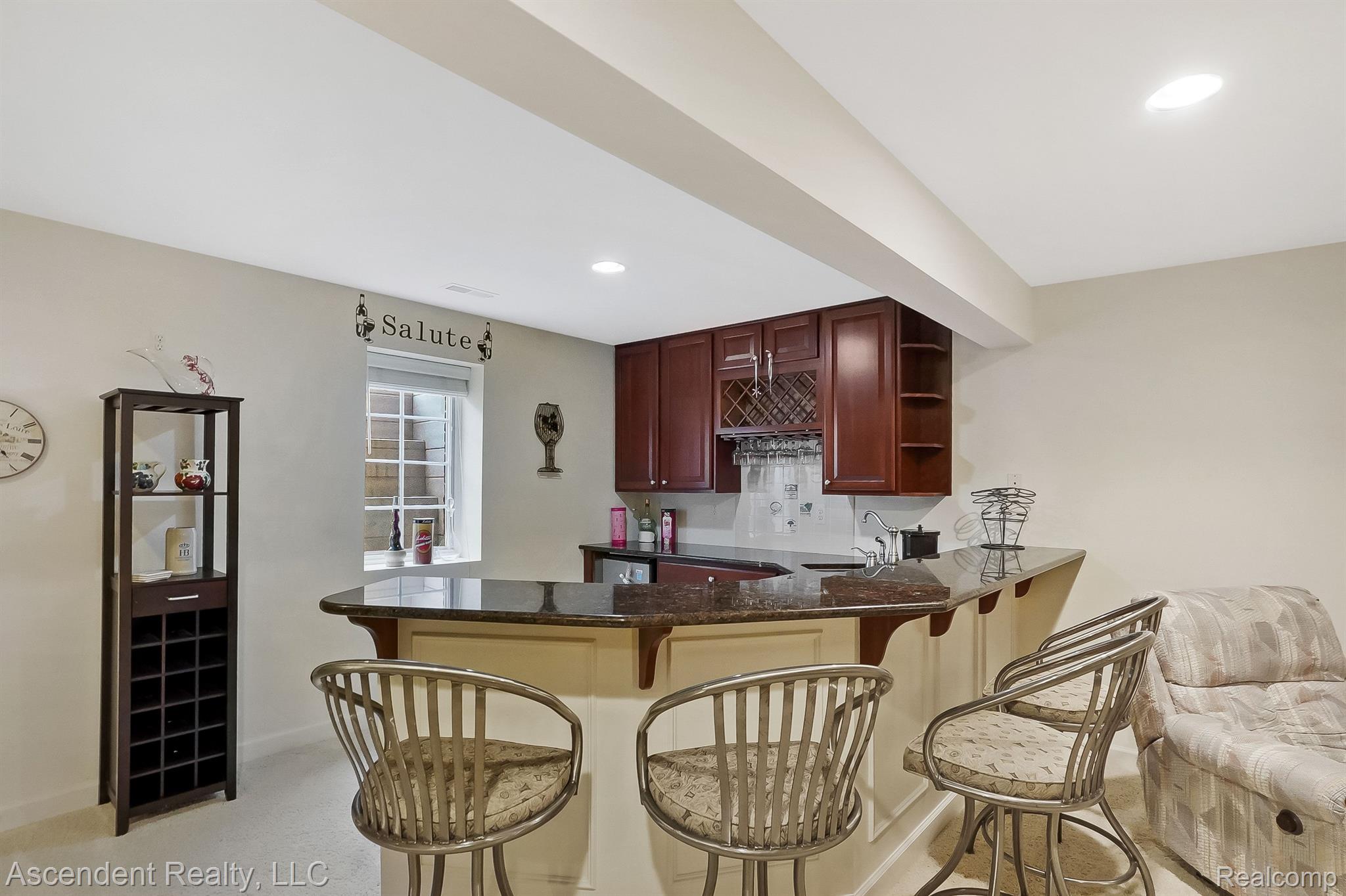 3704 Tremonte Circle, Unit 88 Rochester, MI 48306 - Photo 30 of 41 Lower level wet bar