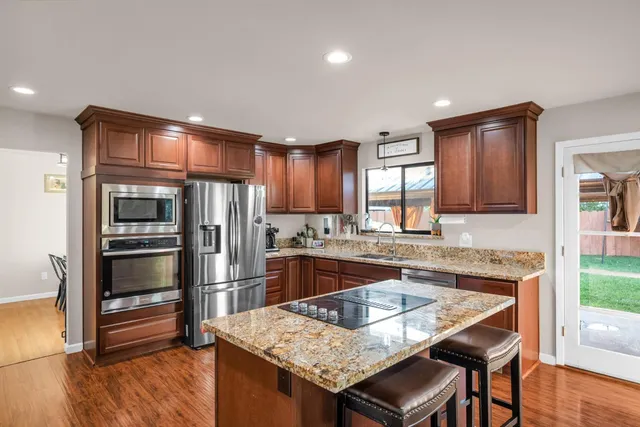 a bed room with a bed and a dresser