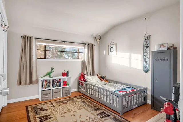 a view of a house with a yard and deck