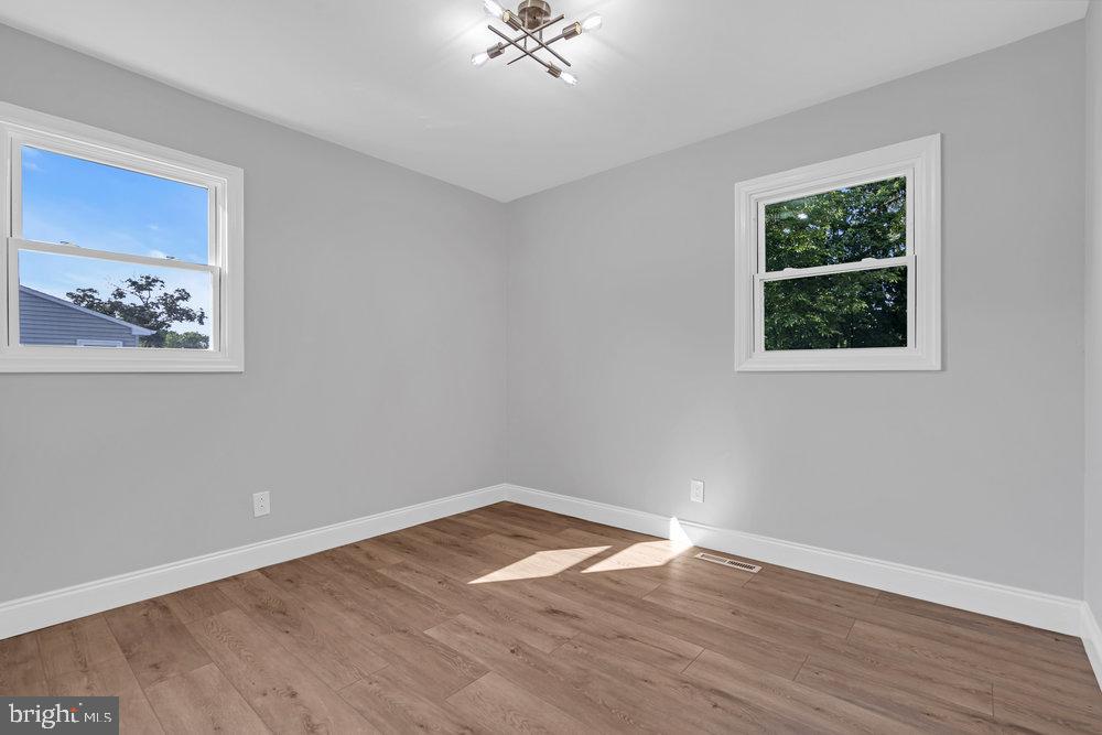 328 Ithaca Avenue Delran, NJ 08075 - Photo 16 of 24 a view of a room with wooden floor and window