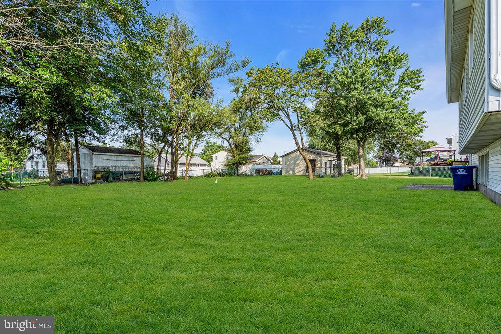 328 Ithaca Avenue Delran, NJ 08075 - Photo 23 of 24 a view of green field with tree in the background