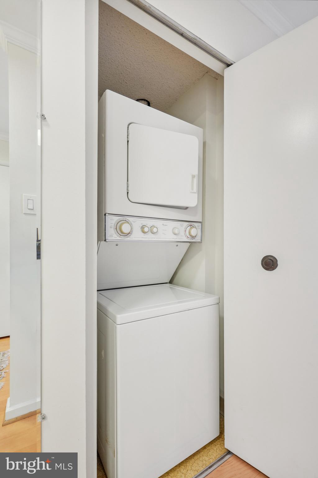 2141 P Street Northwest, Unit 709 Washington, DC 20037 - Photo 16 of 23 a utility room with dryer and washer
