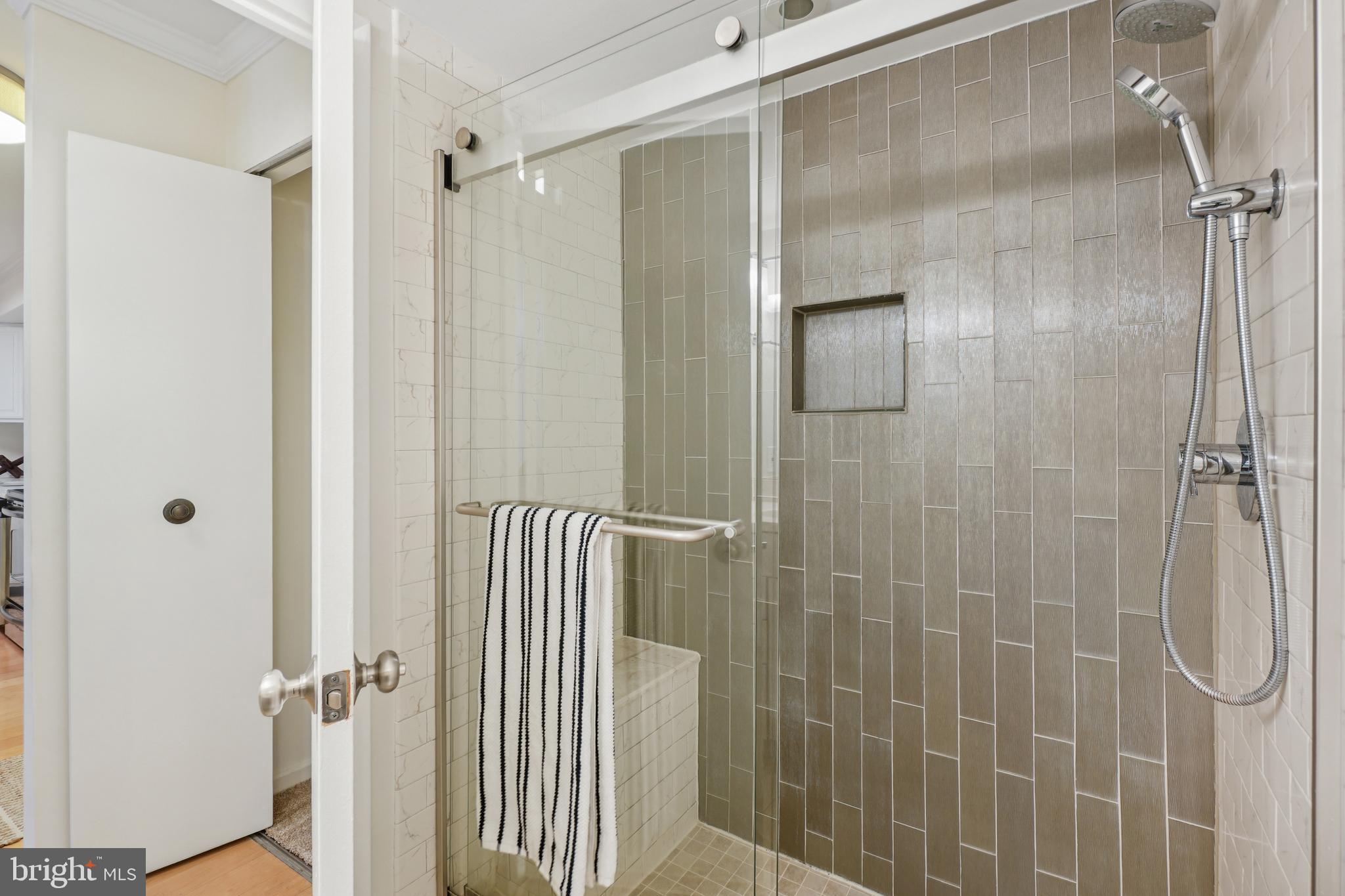 2141 P Street Northwest, Unit 709 Washington, DC 20037 - Photo 18 of 23 a bathroom with a shower