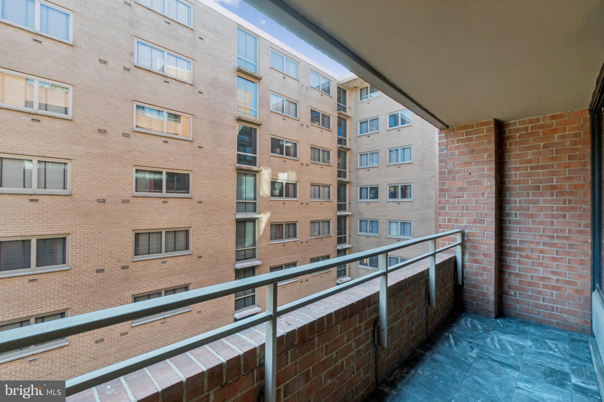 2141 P Street Northwest, Unit 709 Washington, DC 20037 - Photo 21 of 23 a view of a building with a window