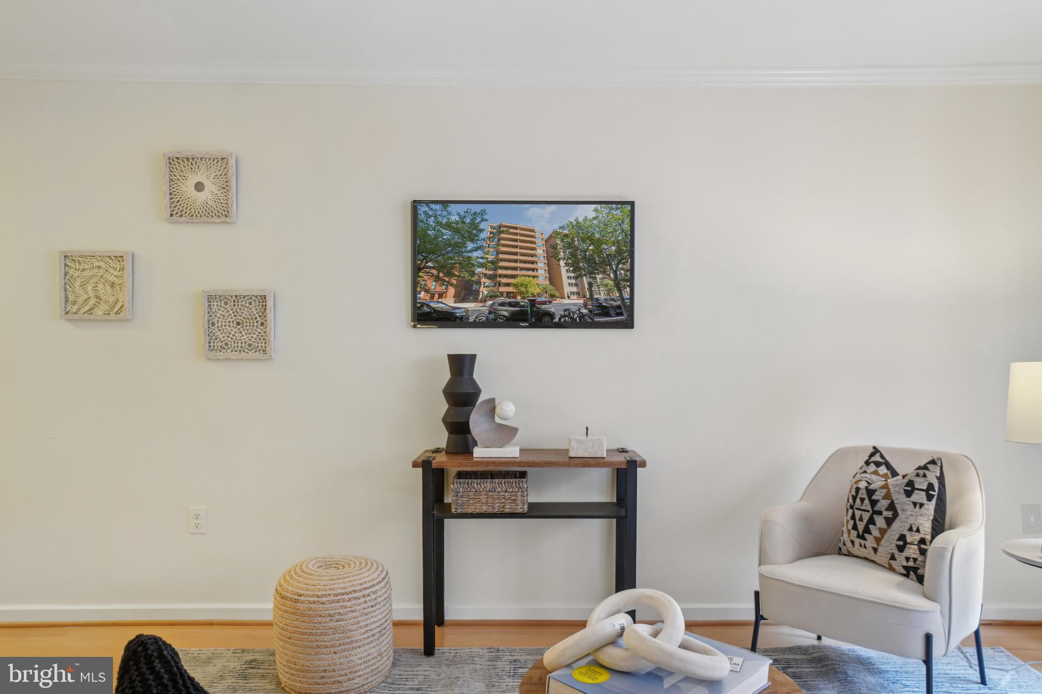 2141 P Street Northwest, Unit 709 Washington, DC 20037 - Photo 9 of 23 a living room with furniture and a wall painting