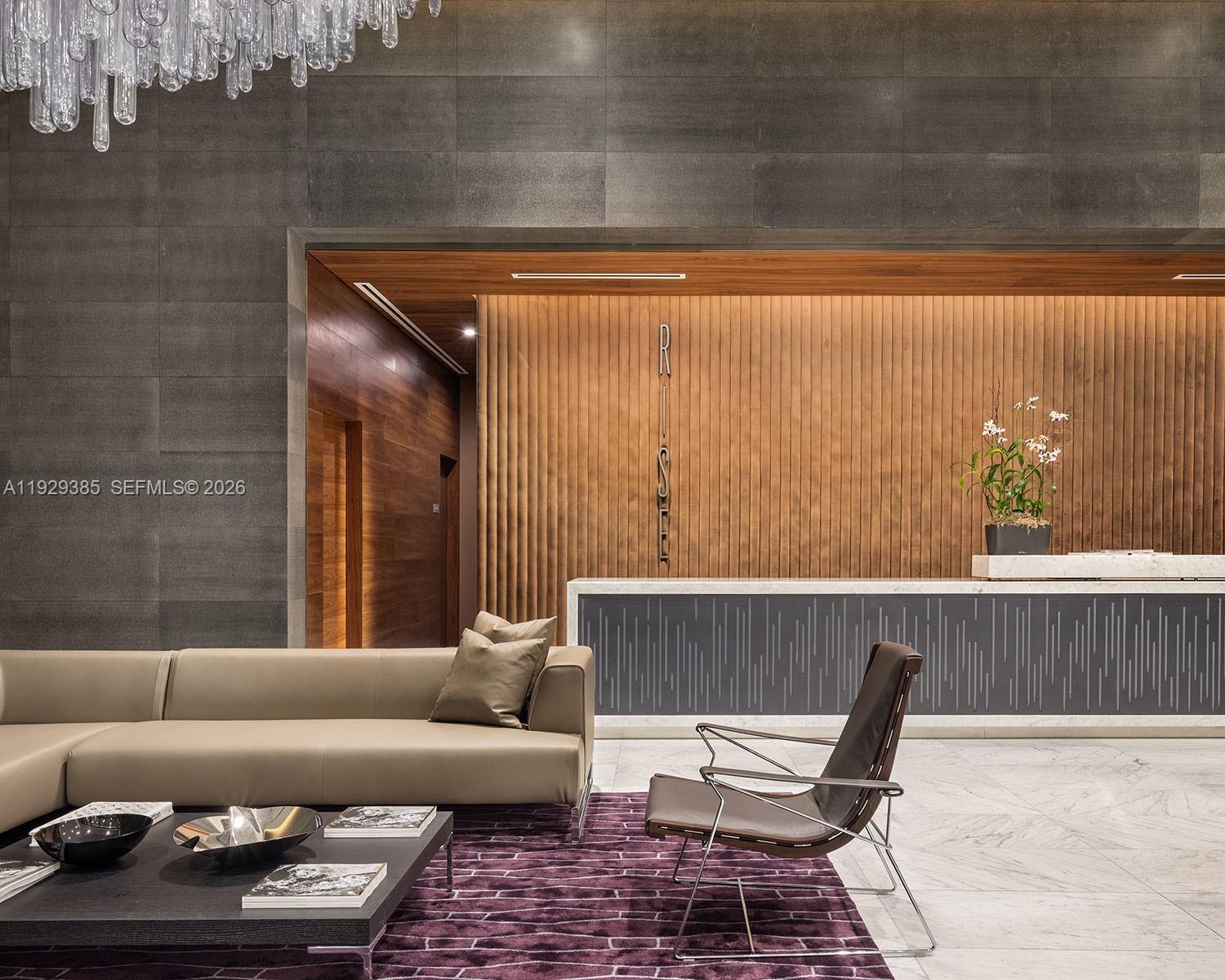 88 Southwest 7th Street, Unit 2501 Miami, FL 33130 - Photo 26 of 38 a living room with furniture and a couch