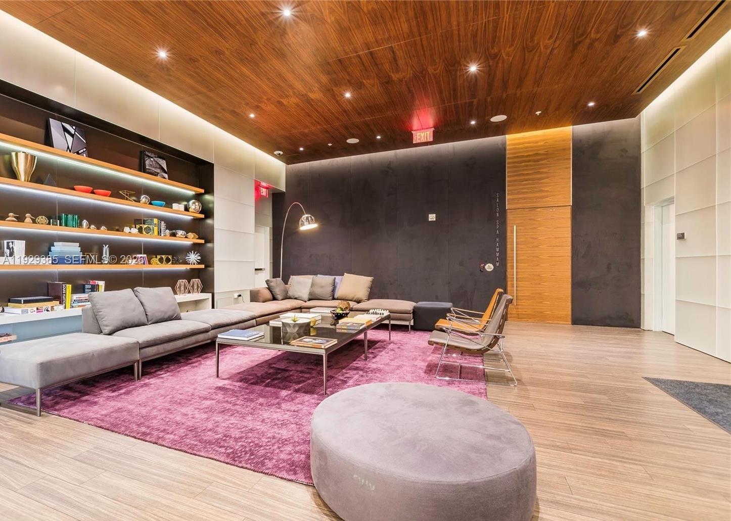 88 Southwest 7th Street, Unit 2501 Miami, FL 33130 - Photo 30 of 38 a living room with furniture and wooden floor