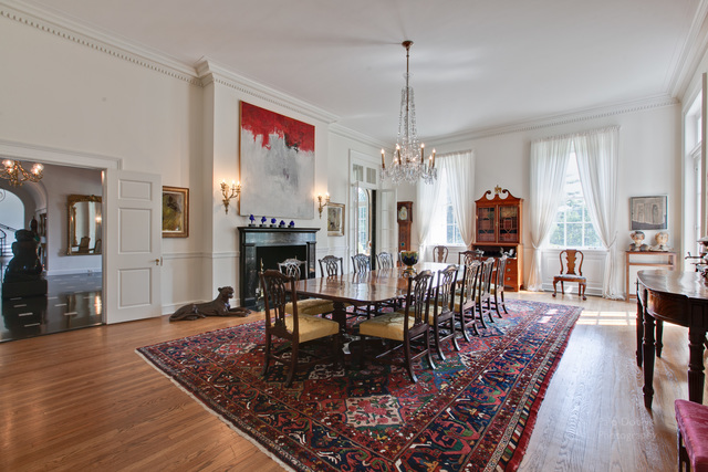 965 East Deerpath Road Lake Forest, IL 60045 - Photo 12 of 25 a living room with furniture a fireplace and a chandelier