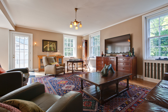 965 East Deerpath Road Lake Forest, IL 60045 - Photo 17 of 25 a living room with furniture and a flat screen tv