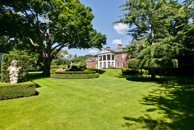 965 East Deerpath Road Lake Forest, IL 60045 - Photo 18 of 25 a view of a house with a big yard