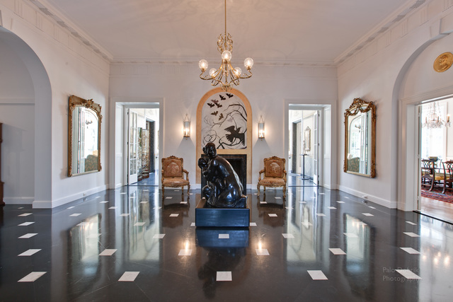 965 East Deerpath Road Lake Forest, IL 60045 - Photo 3 of 25 a view of a hallway with entryway wooden floor and front door
