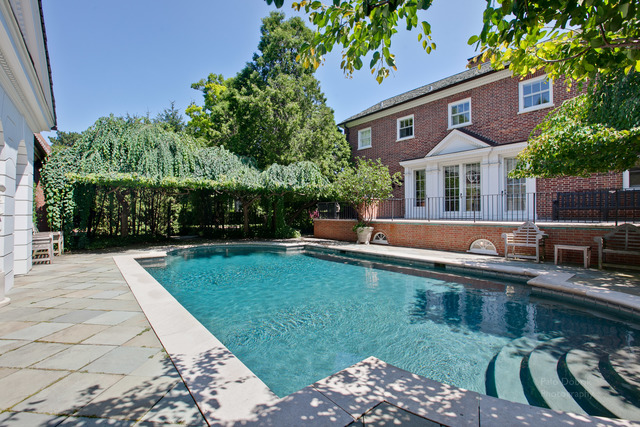 965 East Deerpath Road Lake Forest, IL 60045 - Photo 22 of 25 a house view with a seating space and garden view