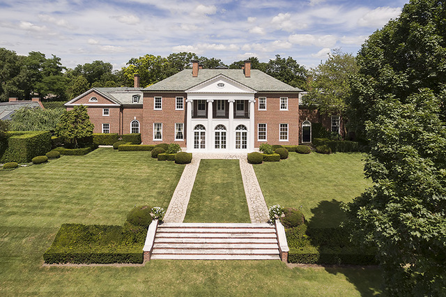 965 East Deerpath Road Lake Forest, IL 60045 - Photo 25 of 25 a front view of a house with a yard