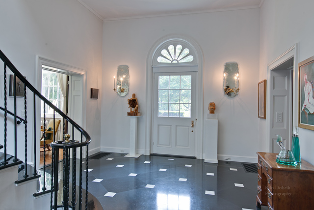 965 East Deerpath Road Lake Forest, IL 60045 - Photo 8 of 25 wooden floor with windows and entryway