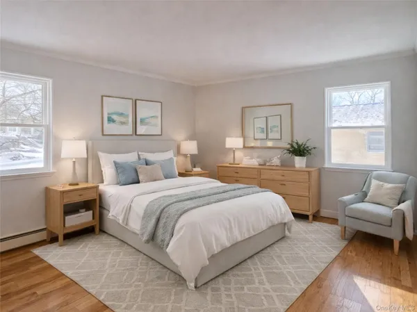 a spacious bedroom with a bed and a couch