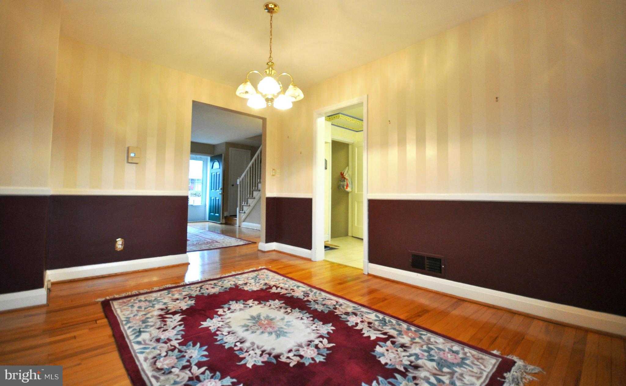 1815 Yakona Road Baltimore, MD 21234 - Photo 8 of 30 a view of a room with a chandelier and living room