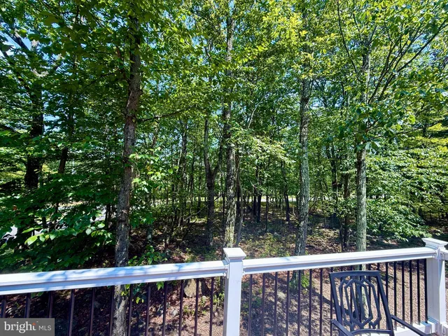 a view of a wooden fence