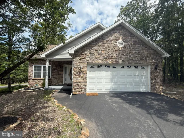 front view of a house with a small yard