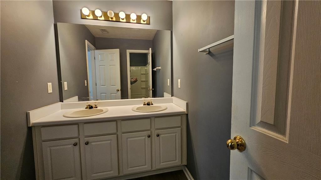 1501 Parc Main Street Lawrenceville, GA 30046 - Photo 11 of 16 a bathroom with a sink and a mirror