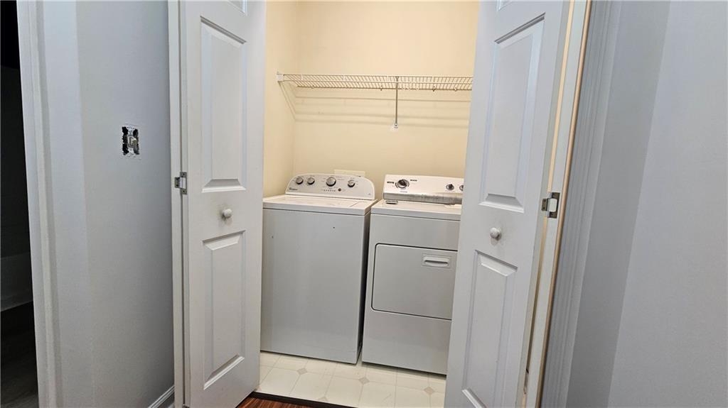 1501 Parc Main Street Lawrenceville, GA 30046 - Photo 13 of 16 a utility room with dryer and washer