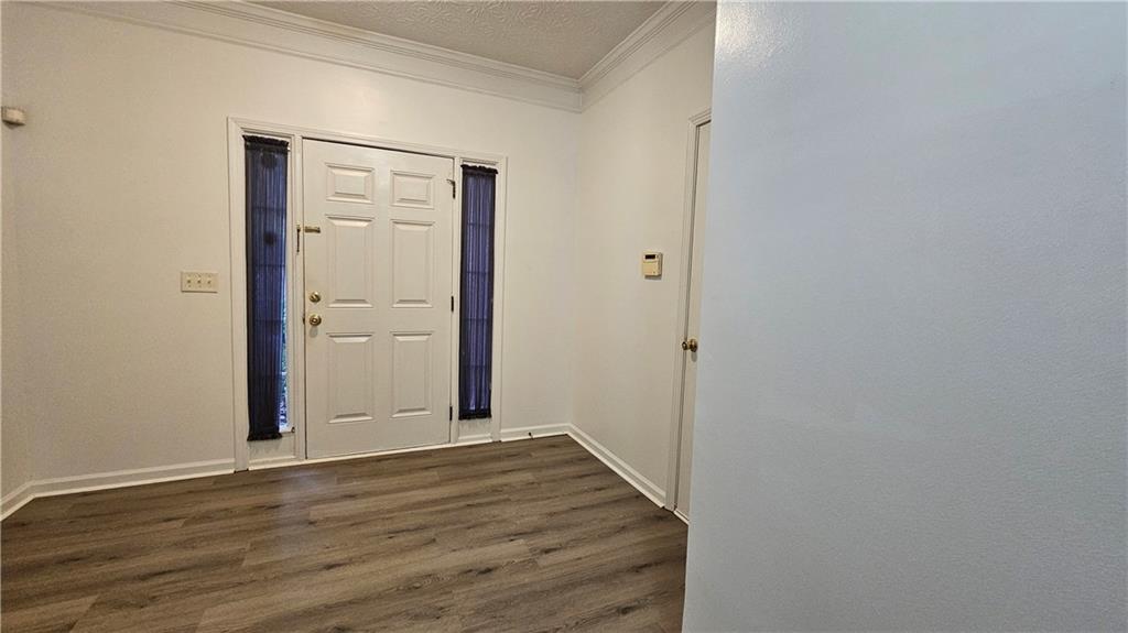 1501 Parc Main Street Lawrenceville, GA 30046 - Photo 2 of 16 a view of a room with wooden floor