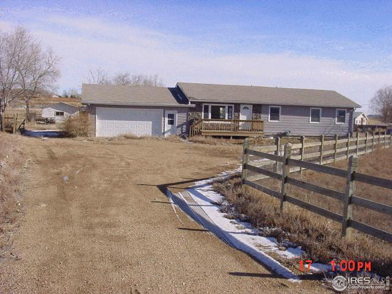 14438 East County Line Road Longmont, CO 80504 - Photo 1 of 1 a view of a house with wooden fence