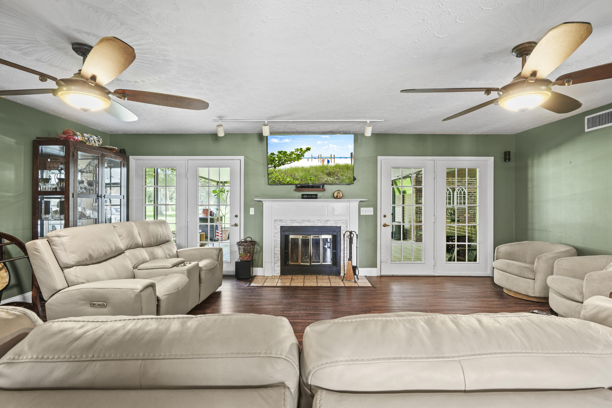 4170 McCarty Road Fort Pierce, FL 34945 - Photo 19 of 57 a living room with furniture fireplace and a large window