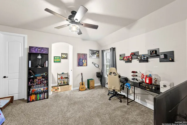 a view of a dining room with furniture large windows and wooden floor