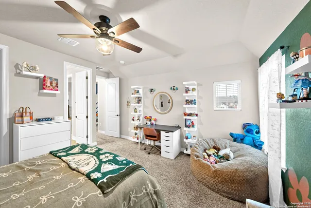 a view of a house with backyard sitting area and garden