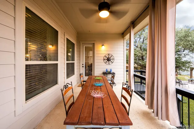 a view of a swimming pool with an outdoor space and sitting area