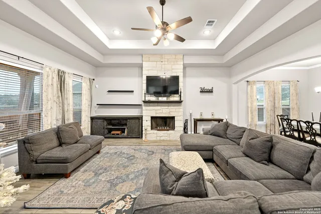 a kitchen with granite countertop a refrigerator and a sink