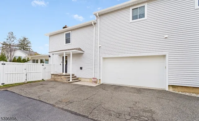 a view of a house with a garage