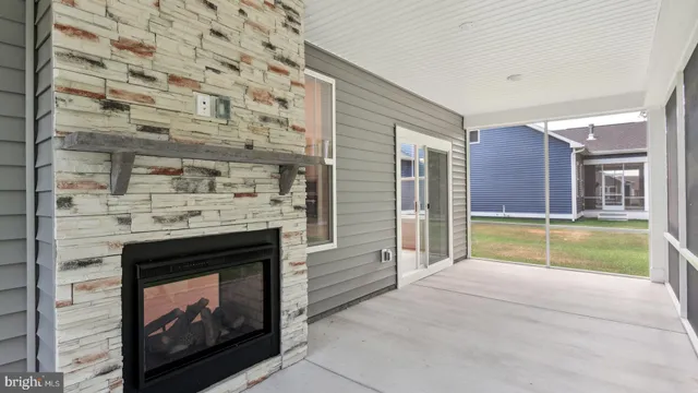 a bathroom with a fireplace and a shower
