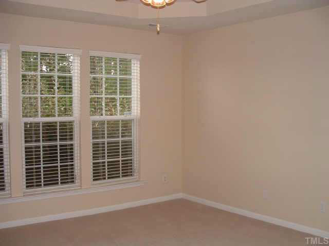 3405 Cathedral Bell Road Raleigh, NC 27614 - Photo 8 of 10 a view of empty room with windows