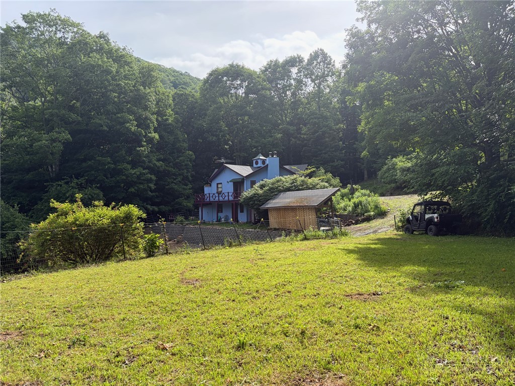 873 Silverleaf Road Zionville, NC 28698 - Photo 9 of 49 a view of a house with a yard