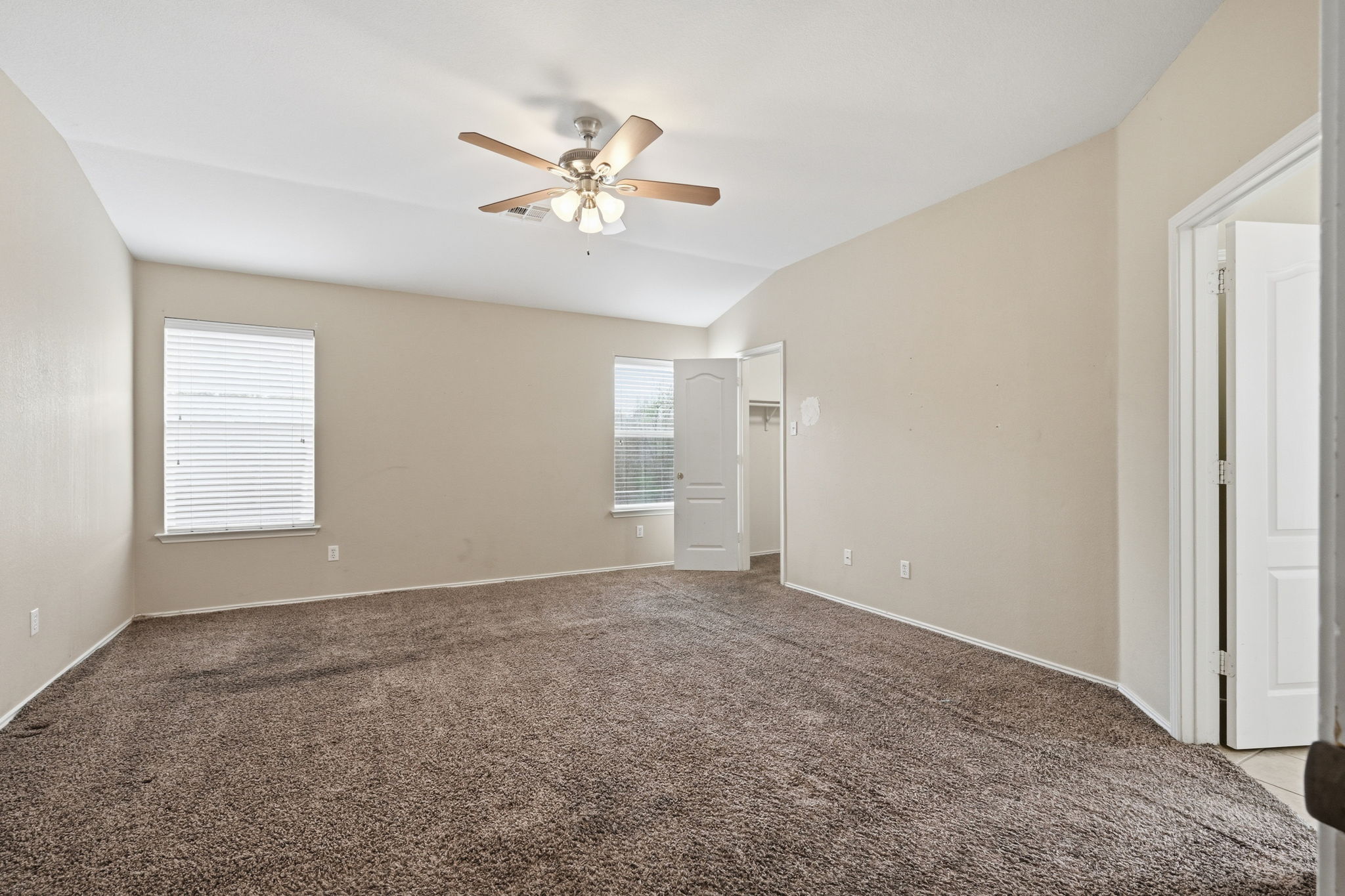 12621 Waynespur Lane Elgin, TX 78621 - Photo 13 of 34 a view of an empty room with a window