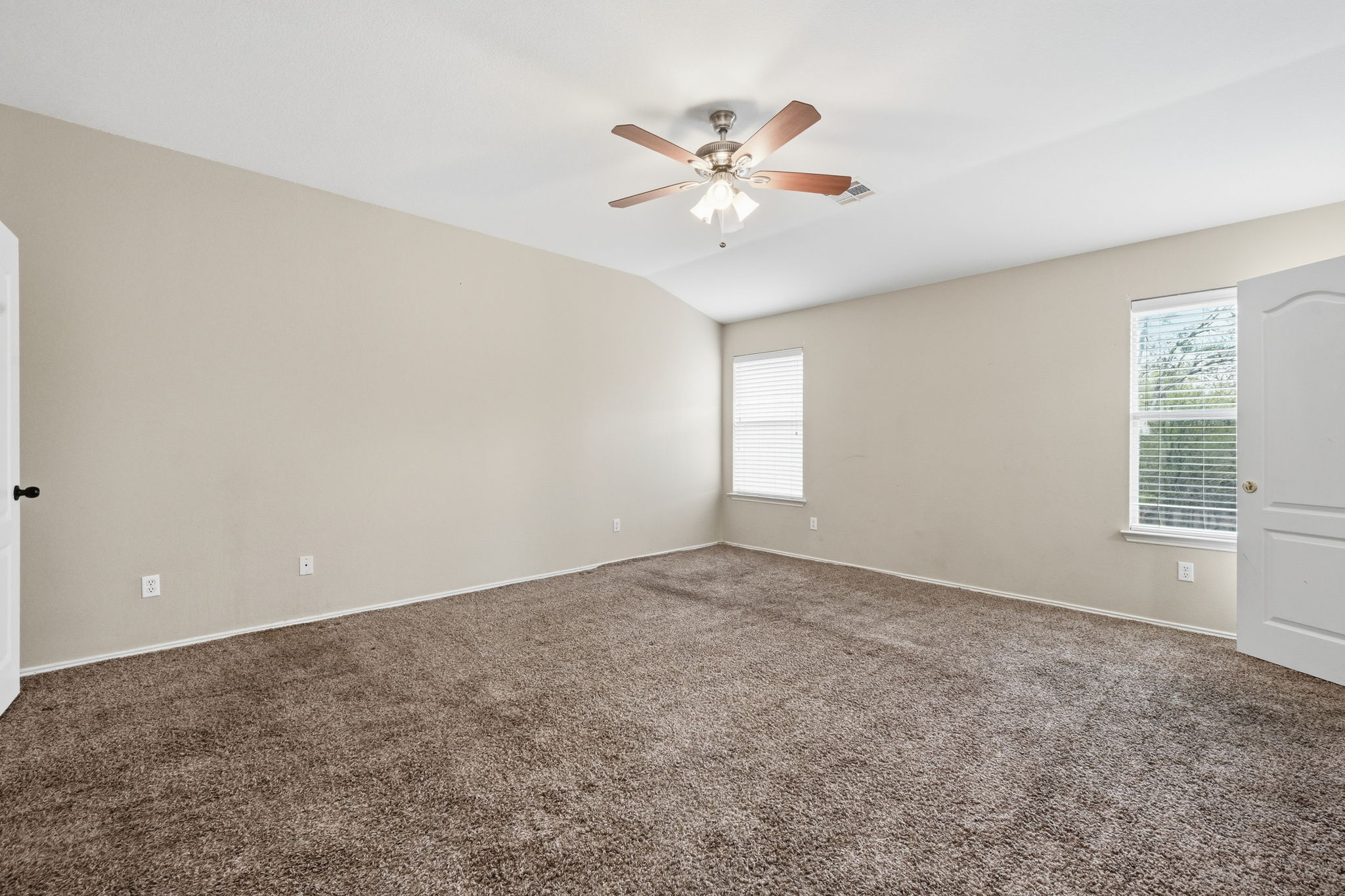 12621 Waynespur Lane Elgin, TX 78621 - Photo 14 of 34 a view of an empty room with a window