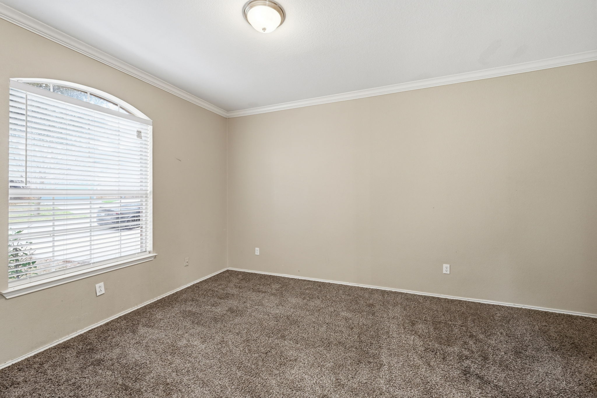 12621 Waynespur Lane Elgin, TX 78621 - Photo 18 of 34 an empty room with a window