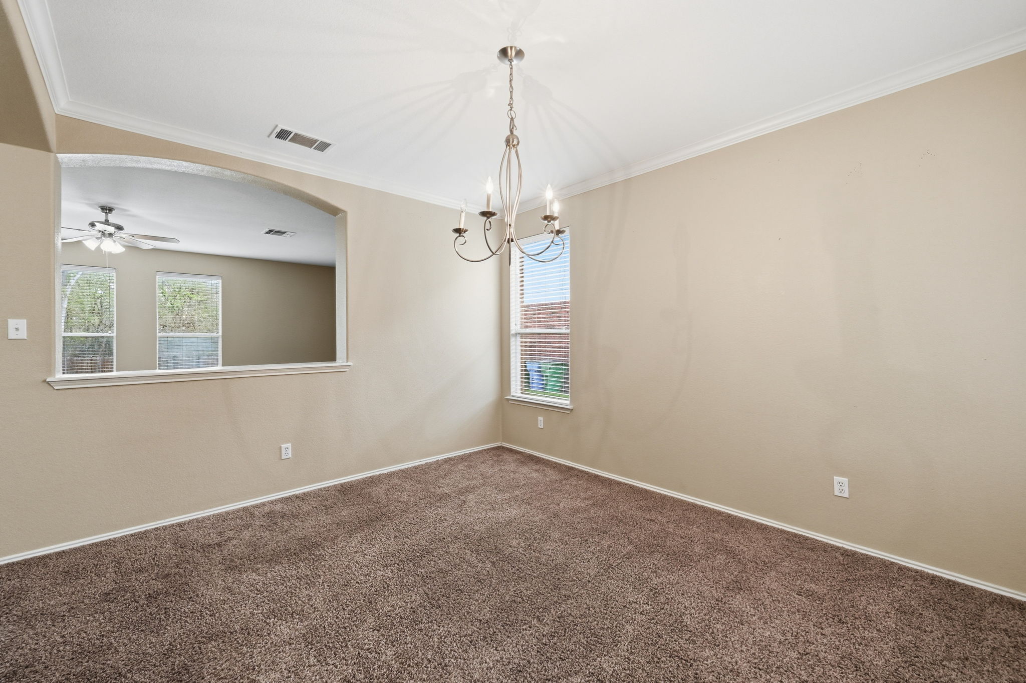 12621 Waynespur Lane Elgin, TX 78621 - Photo 5 of 34 a view of a room that has a window in it