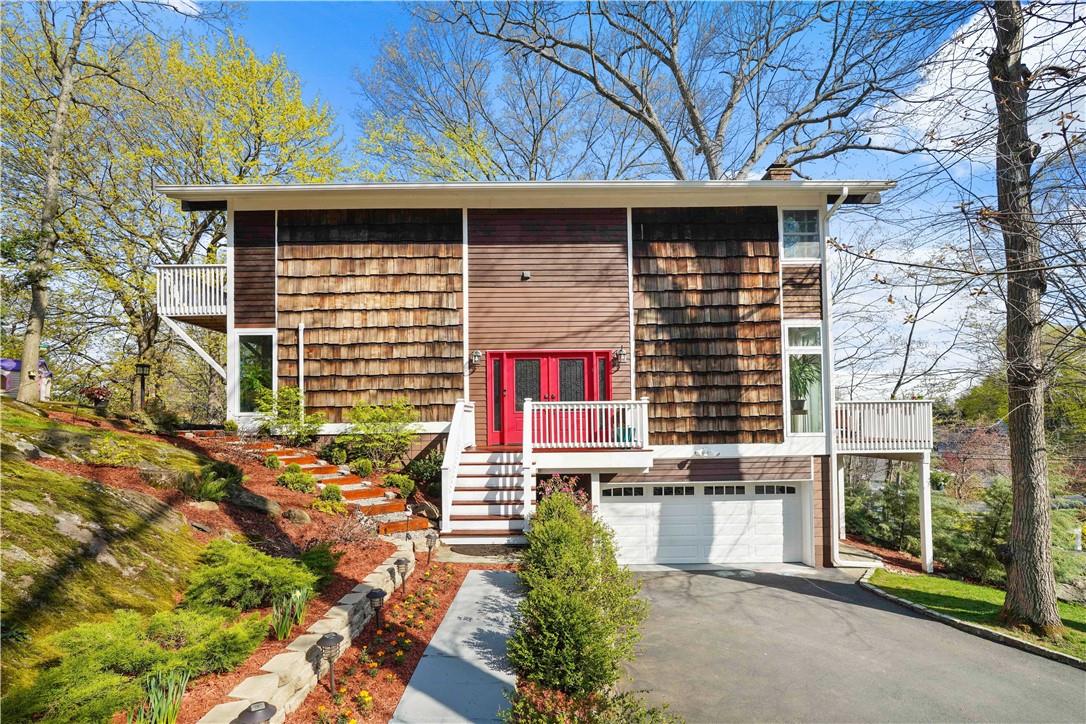 Welcome Home to 54 Bramblebrook, this Unique Mid-Century Modern Contemporary Colonial Dream.
