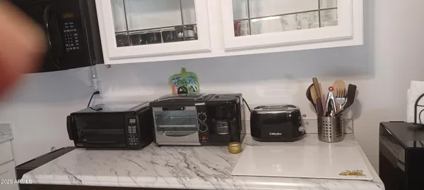 a utility room with washer and dryer