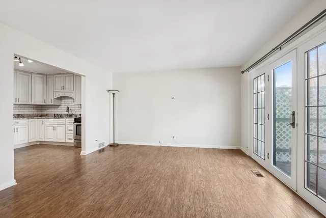 a view of kitchen with wooden floor