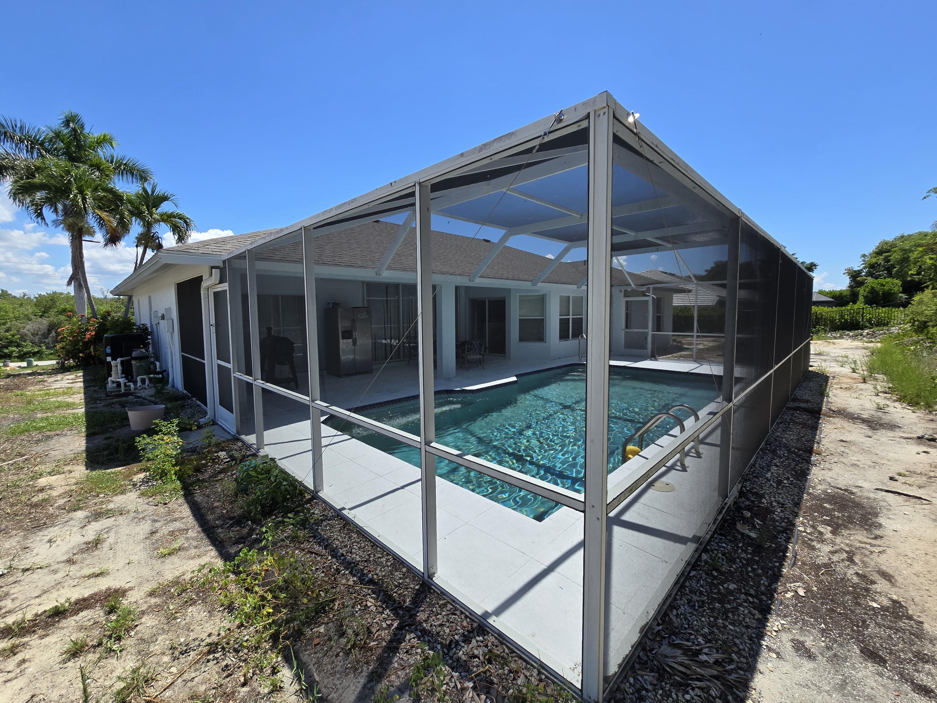 2049 San Marco Road Marco Island, FL 34145 - Photo 11 of 71 Full Cage for Pool!