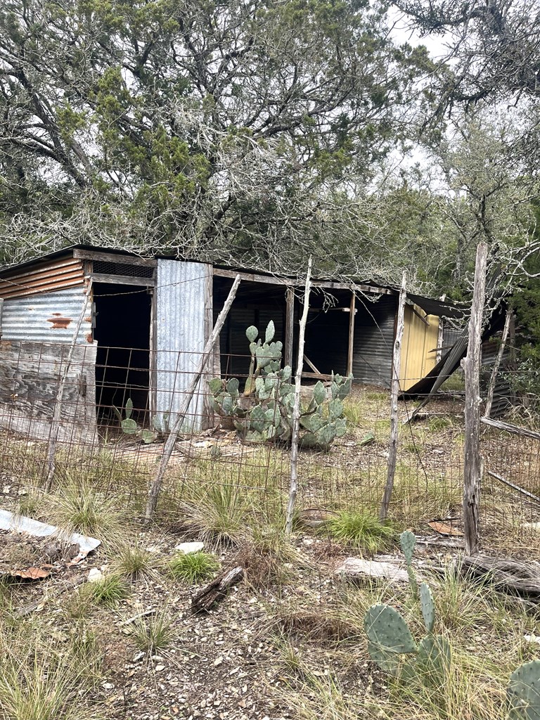 1029 Fairview Road Rocksprings, TX 78880 - Photo 31 of 44 a view of a house with backyard