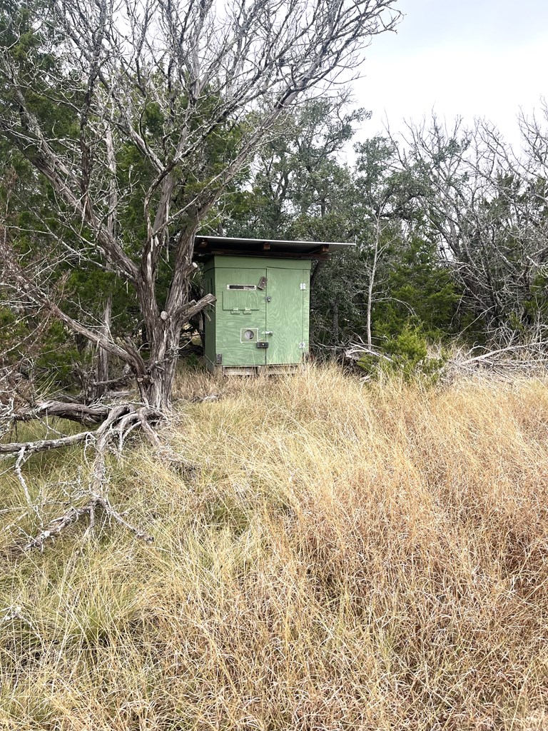 1029 Fairview Road Rocksprings, TX 78880 - Photo 37 of 44 a backyard of a house with lots of green space