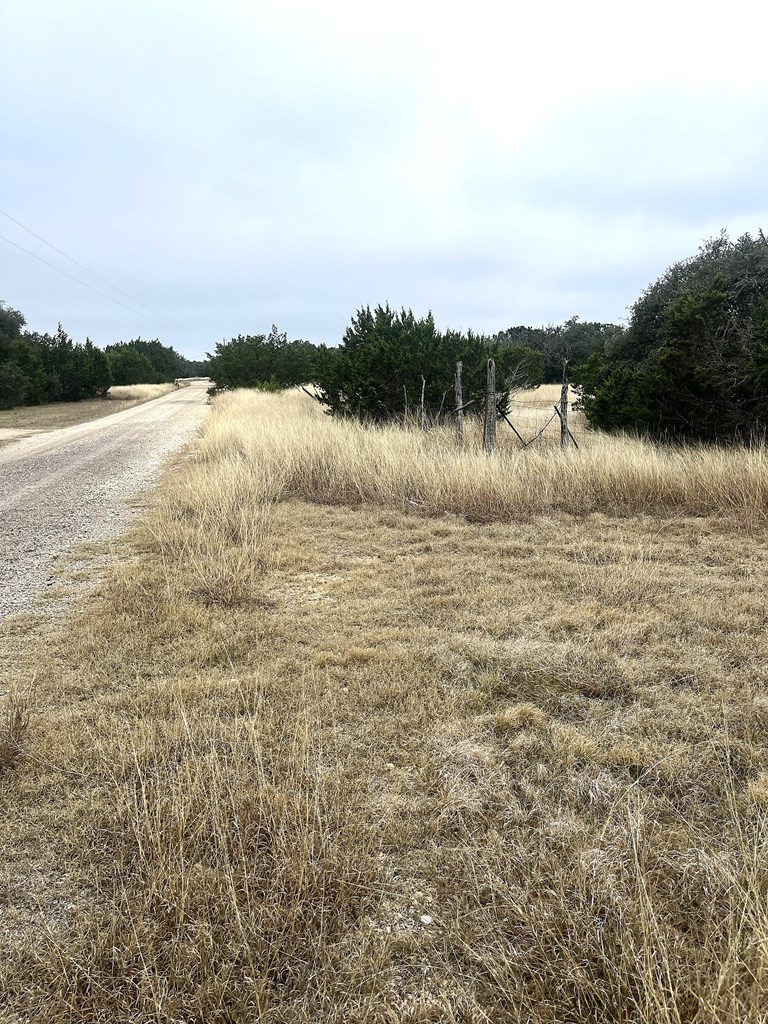 1029 Fairview Road Rocksprings, TX 78880 - Photo 5 of 44 a view of a lake from a yard
