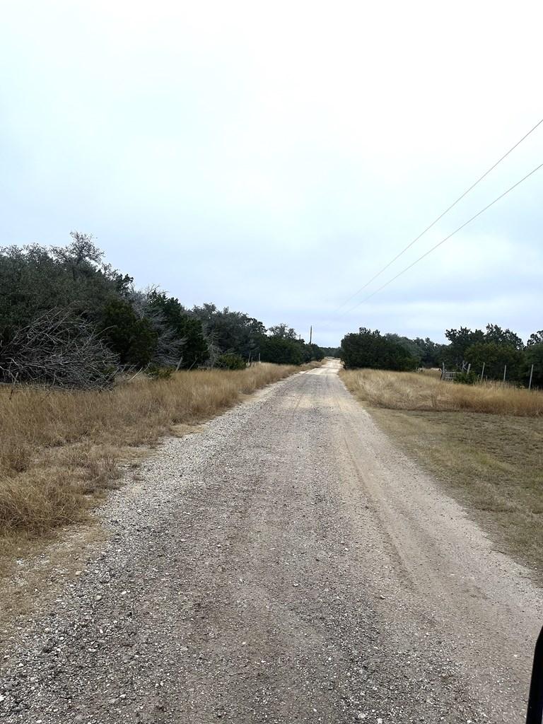 1029 Fairview Road Rocksprings, TX 78880 - Photo 6 of 44 a view of a lake with houses in the back