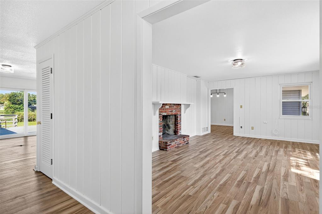 1520 South Keene Road Clearwater, FL 33756 - Photo 16 of 60 a view of a livingroom with wooden floor and a window