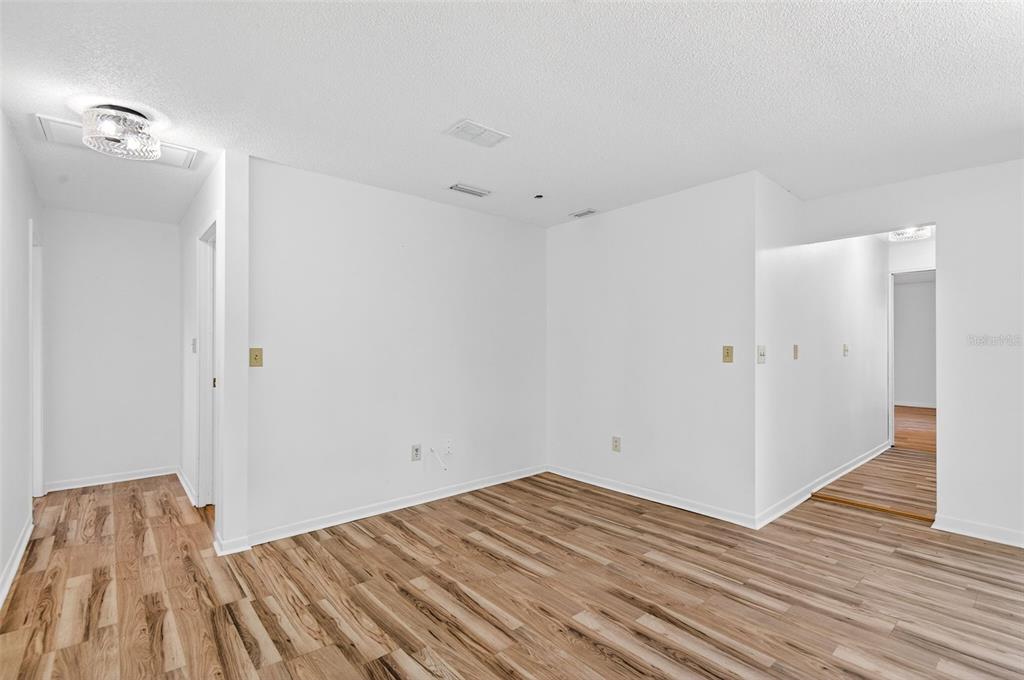 1520 South Keene Road Clearwater, FL 33756 - Photo 23 of 60 a view of empty room with wooden floor